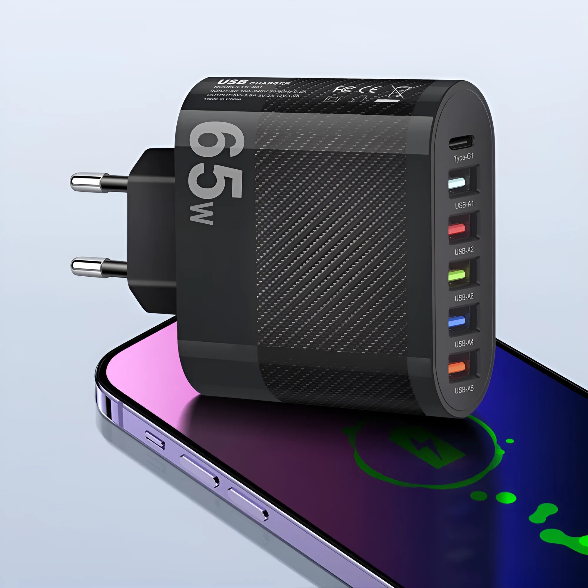 White and black mobile phone charging plugs with USB port and UK/US/EU outlet options