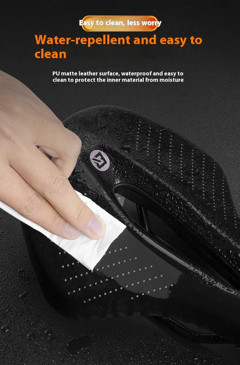 Black and pink mountain bike seat cushion with PU foam padding on bicycle saddle
