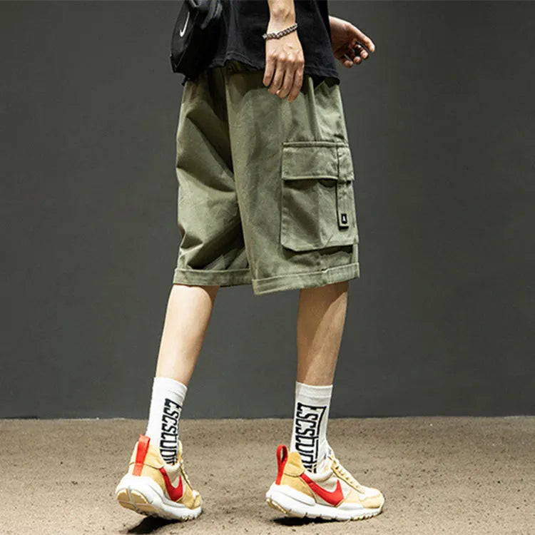 Men's cotton cargo shorts in khaki with multiple pockets and tie-cord front closure