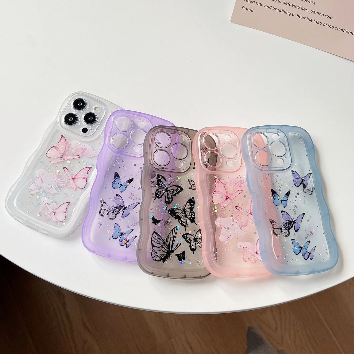 TPU transparent protective phone cover with painted butterfly glitter design and wave pattern for iPhone models
