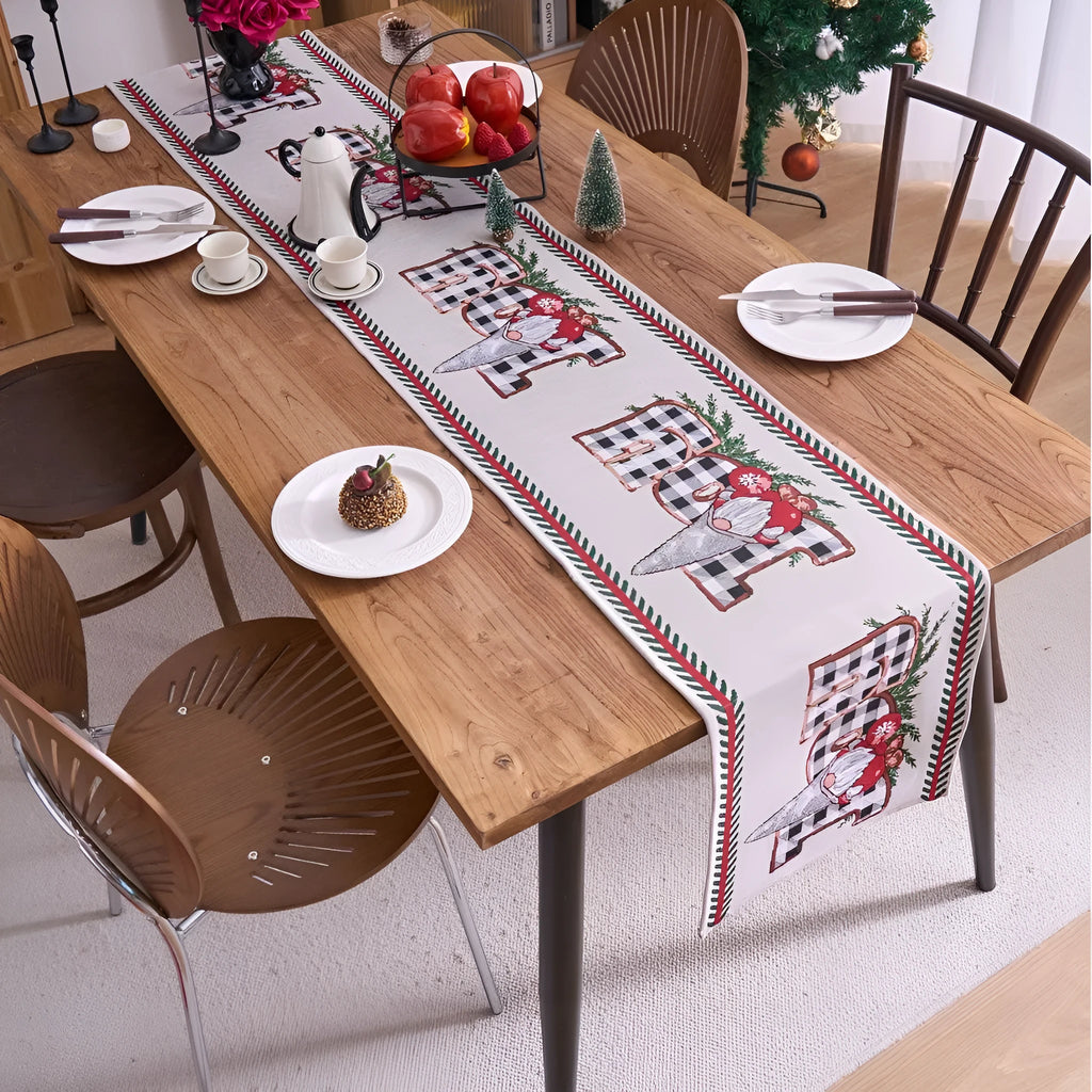 Home Christmas jacquard table runner in polyester cotton with jacquard red deer flat hem design on a table setting