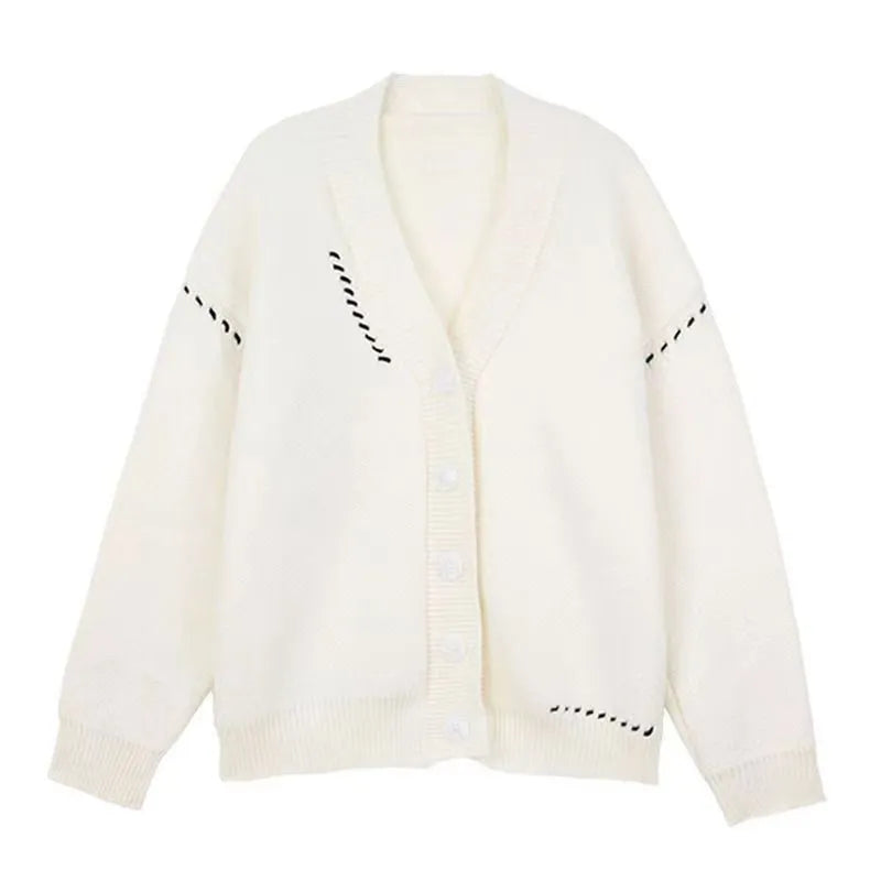 Women's loose fit knitted cardigan coat in black or white, long sleeve design