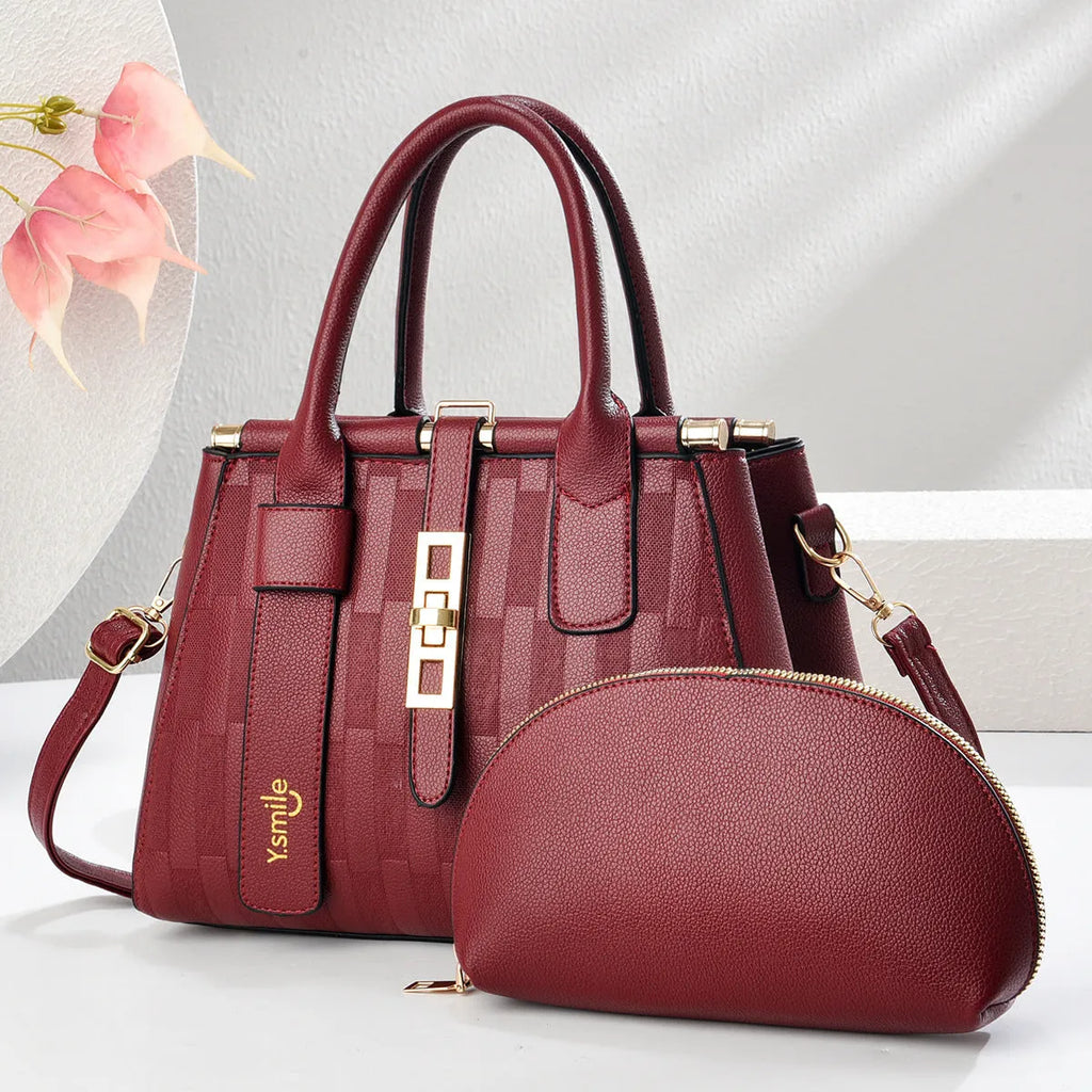 Round suitcase shape crossbody shoulder bag in PU leather measuring 28x13x20cm