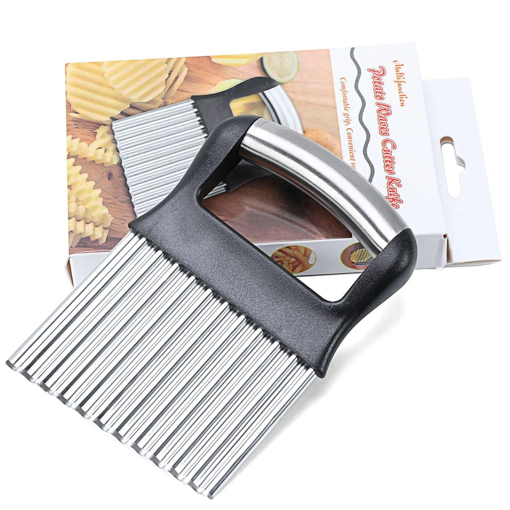 Stainless steel potato wave knife for making crinkle-cut chips on a wooden board.
