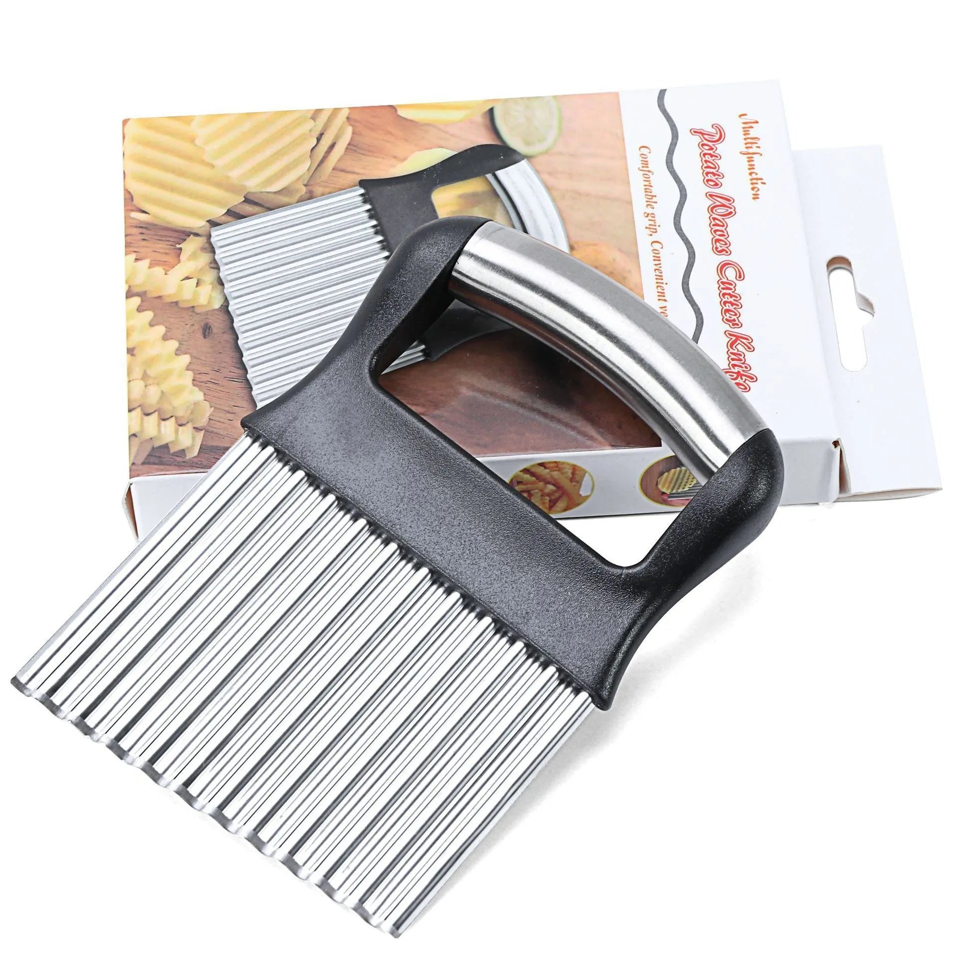 Stainless steel potato wave knife for making crinkle-cut chips on a wooden board.