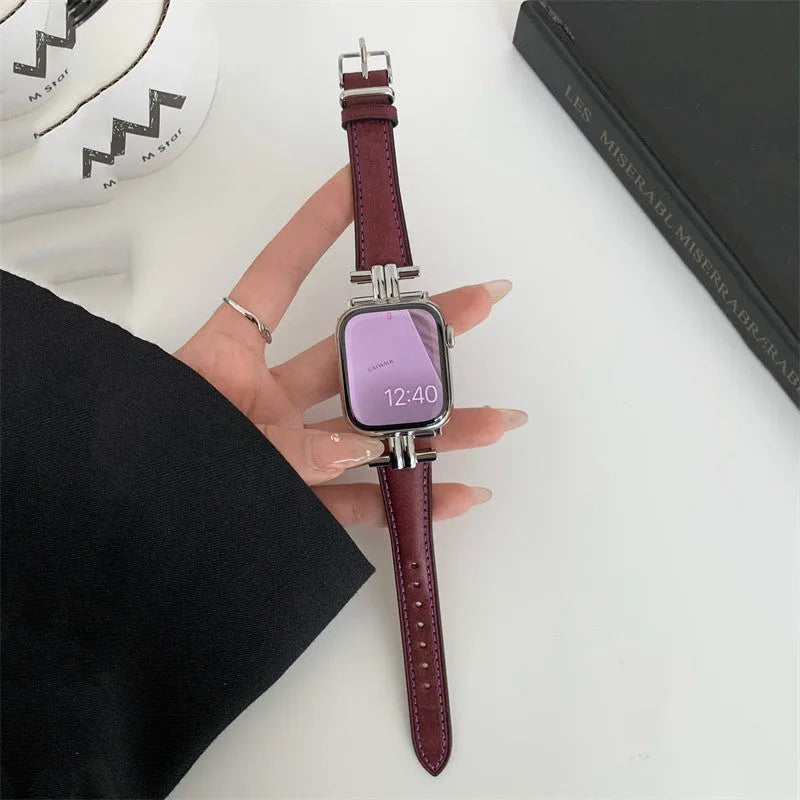 Genuine leather Apple Watch strap with metal stitching in brown colour on a dark background