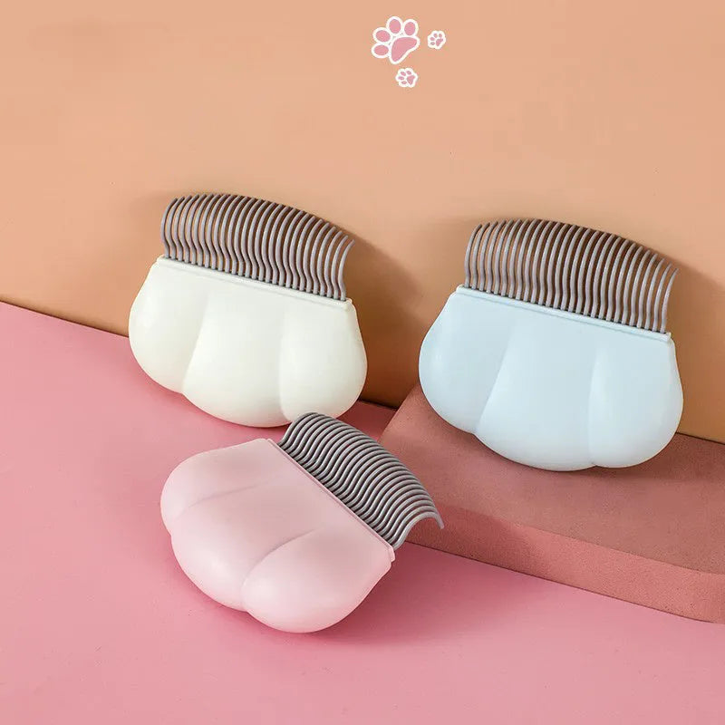 Blue Paw Soft pet deshedding brush with soft round teeth on a white background