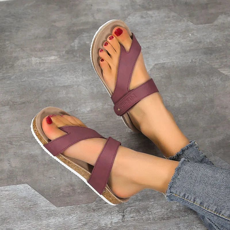 Flat toe ring thick-soled flip-flops in blue, showing foam sole and PU upper.