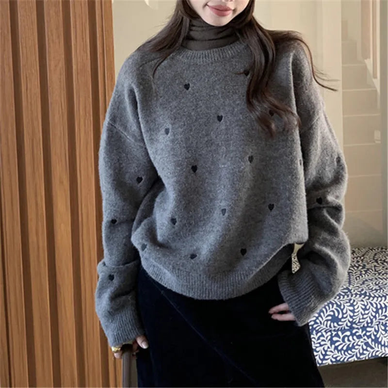 Women's loose fit acrylic pullover sweater with crew neck, long sleeves, and love-pattern embroidery