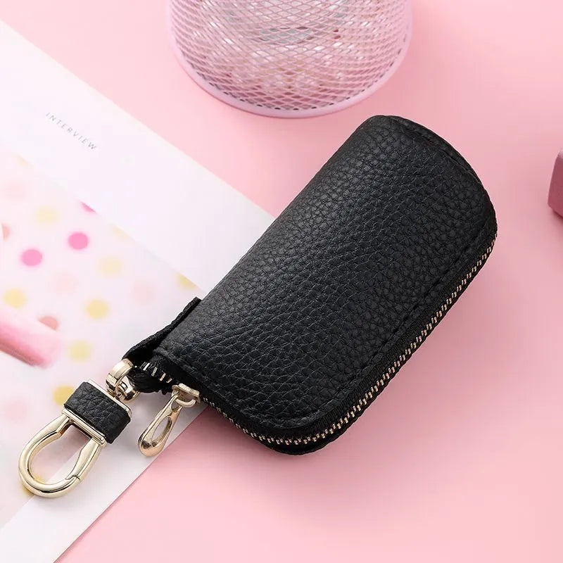 Waterproof PU leather key case in black, grey or pink with zippered expansion compartment