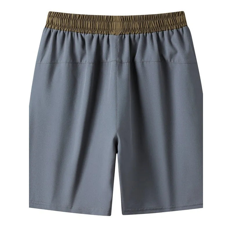 Men's wide waist cropped loose track pants in black and grey for running and fitness