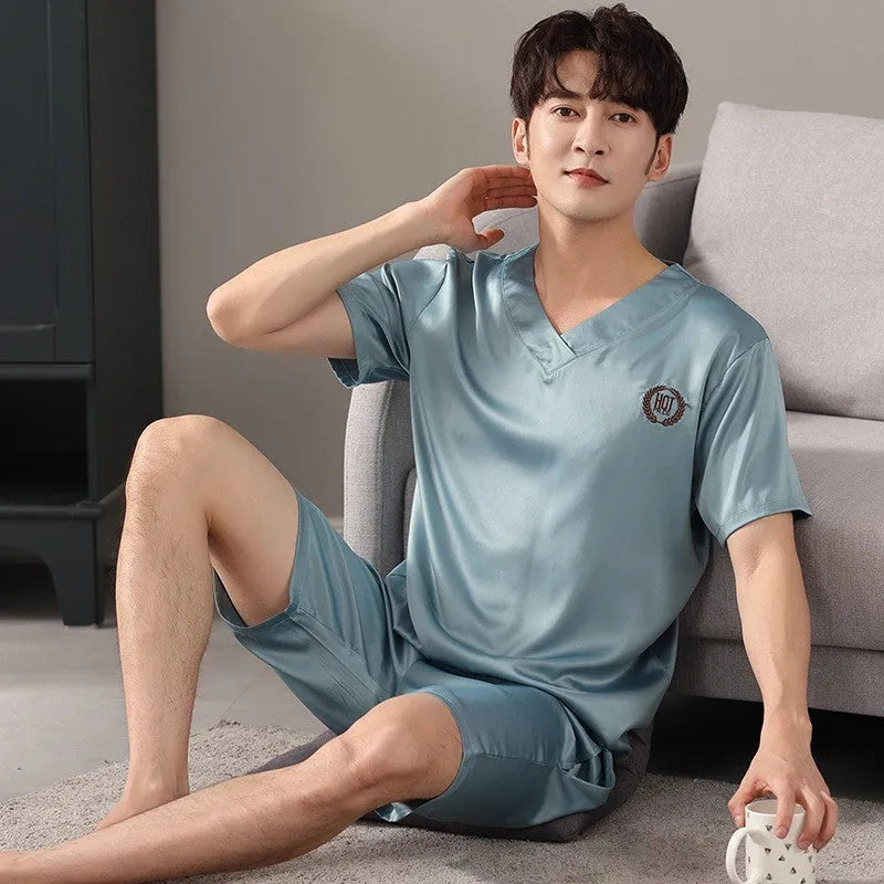 Men's loose fit ice silk short-sleeve pajama shirt and shorts set on a hanger.