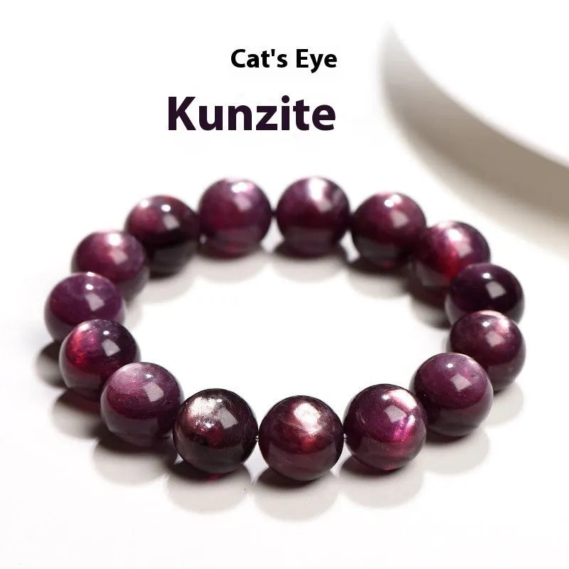 Natural purple lepidolite crystal bracelet with polished round beads on a white background.