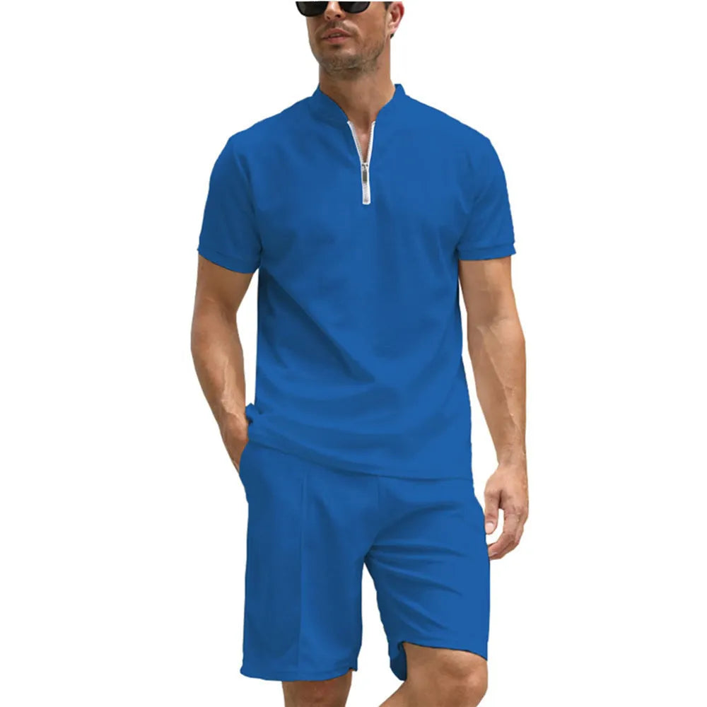 Men's solid colour short sleeve polo shirt and matching trousers two-piece set.
