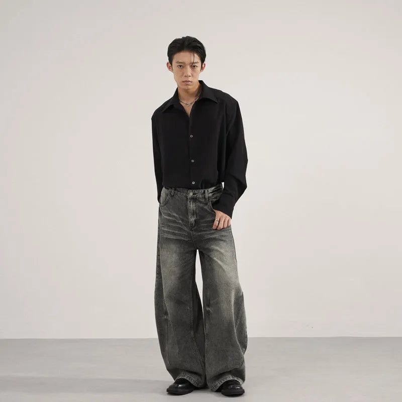 Men's denim straight leg jeans in black and gray washed finish with zip fly