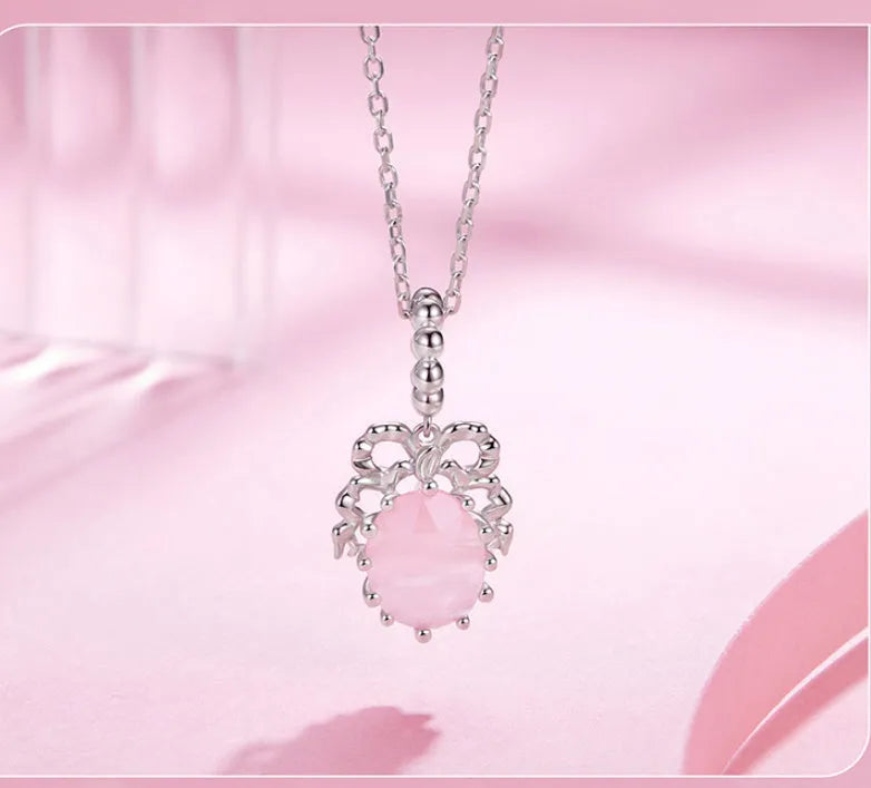 925 silver bow-shaped DIY pendant with electroplated finish, height 2.4cm, width 1.2cm, aperture 0.45cm