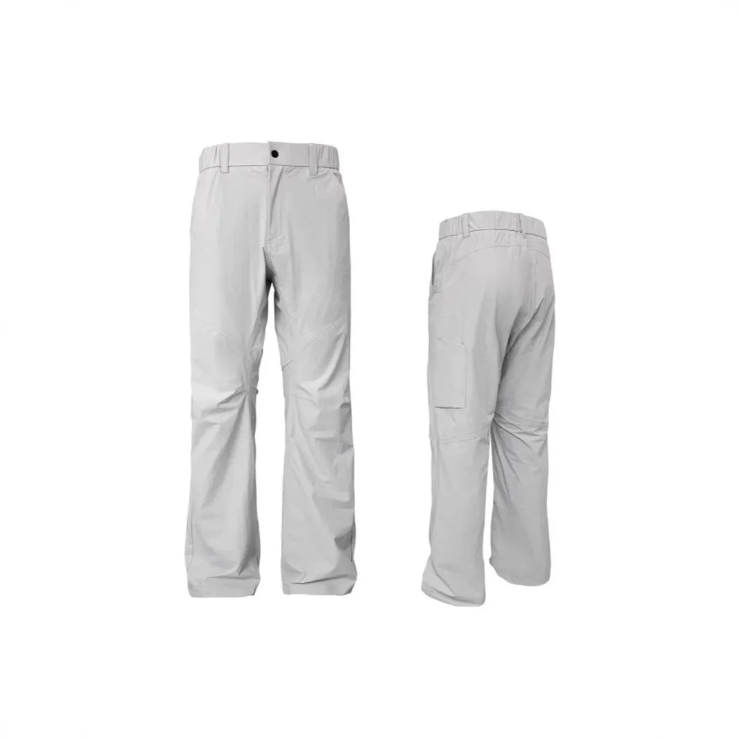 Man wearing grey 3D cut deconstructed casual trousers with a straight leg and elasticated waist.