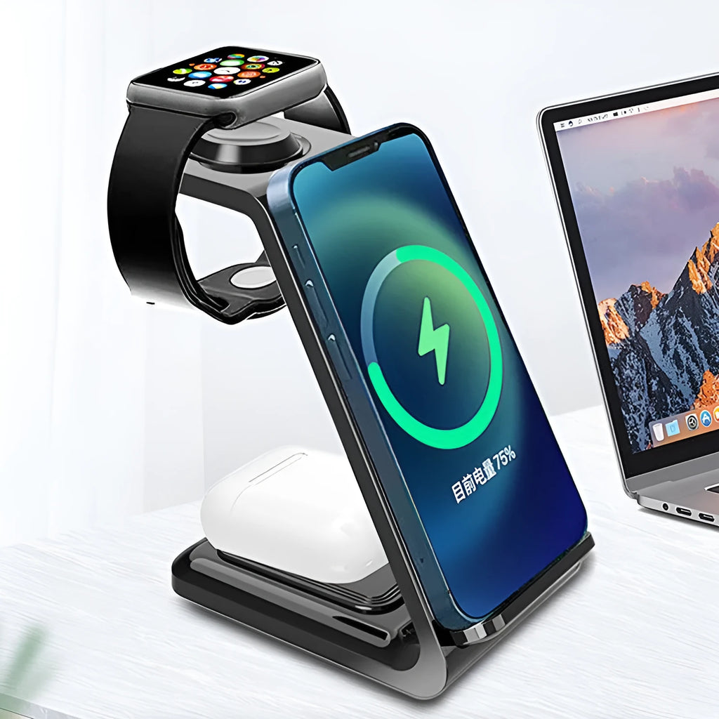White 3-in-1 wireless charging stand holding a mobile phone, smartwatch, and earbuds on a wooden desk.