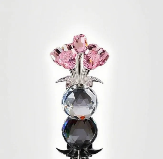 Handcrafted geometric rose ornament made from coloured K9 crystal glass on a neutral background.