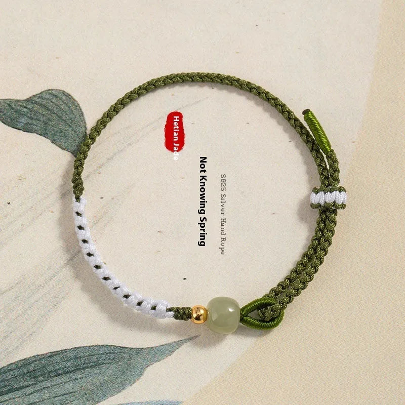 Hetian jade and sterling silver bracelet on a colourful electroplated cord strap.