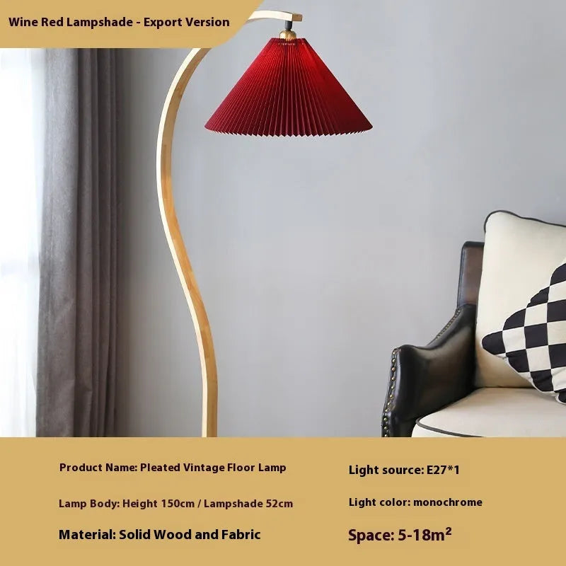 Vertical retro-style table lamp with fabric lampshade on metal base