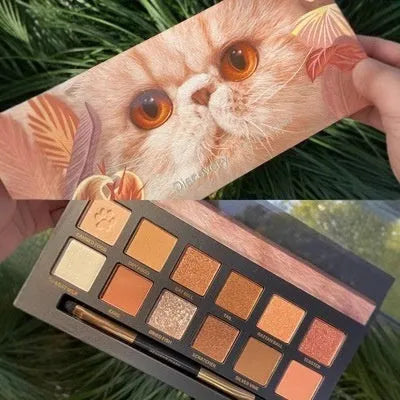 Explorer twelve-colour animal themed eye shadow palette open showing pressed powder shades.