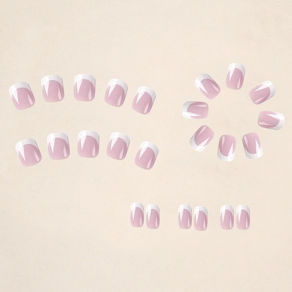 24 white artificial nails with plaid pattern design arranged as nail tips