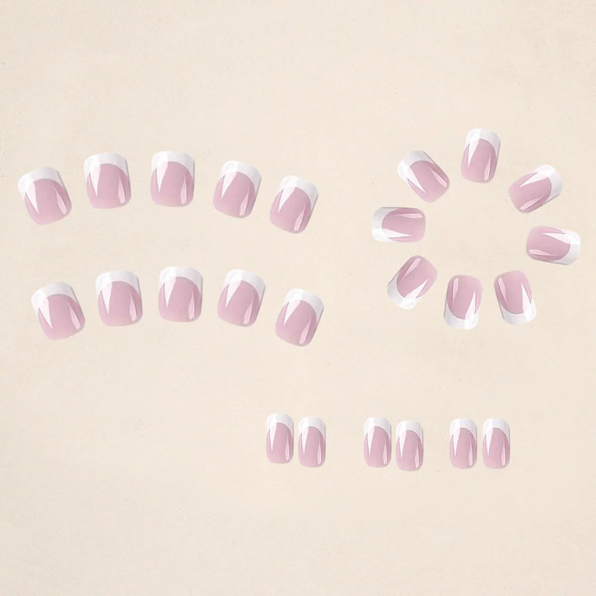 24 white artificial nails with plaid pattern design arranged as nail tips