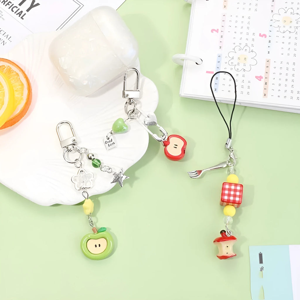 Plastic resin phone charm keychain with semi-handmade apple and strawberry fruit designs
