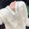 White V-neck beaded knit cardigan with long sleeves in a relaxed fit for women