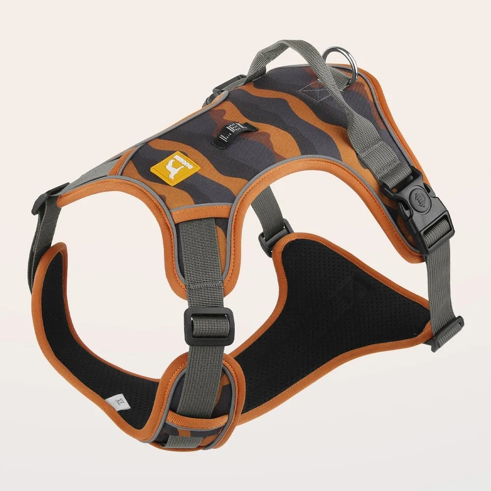 Reflective orange dog harness with chest and back rope attachments and a hand-holding lead.