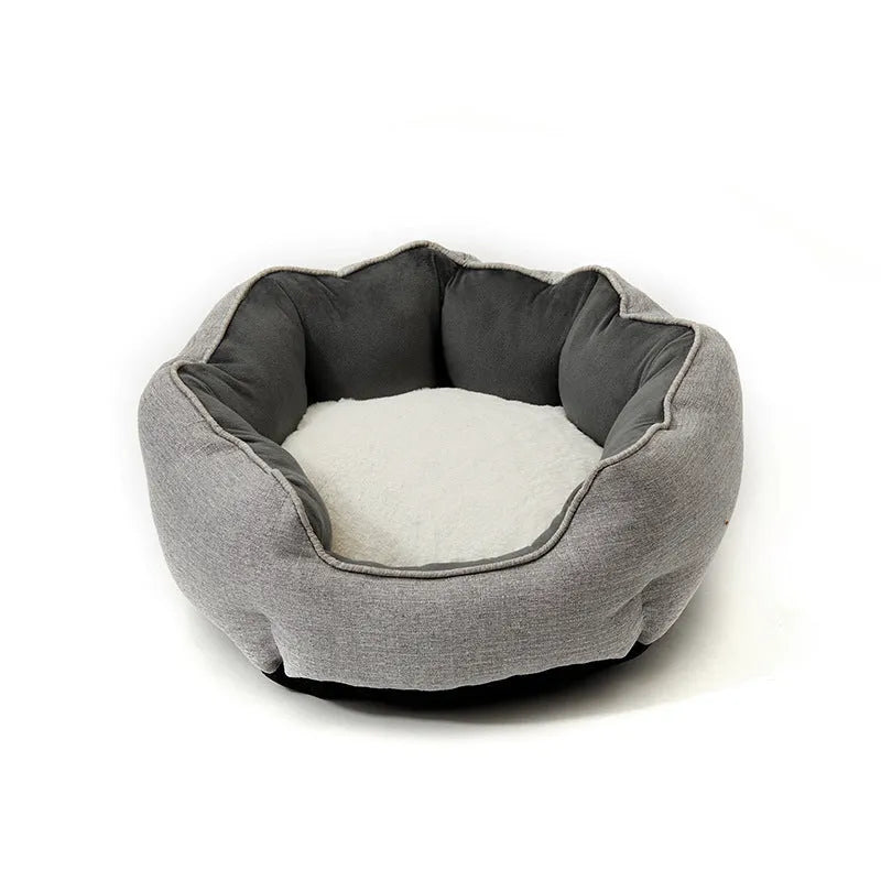 Blue octagonal pet bed with raised sides and a removable mat, for a small dog or cat.