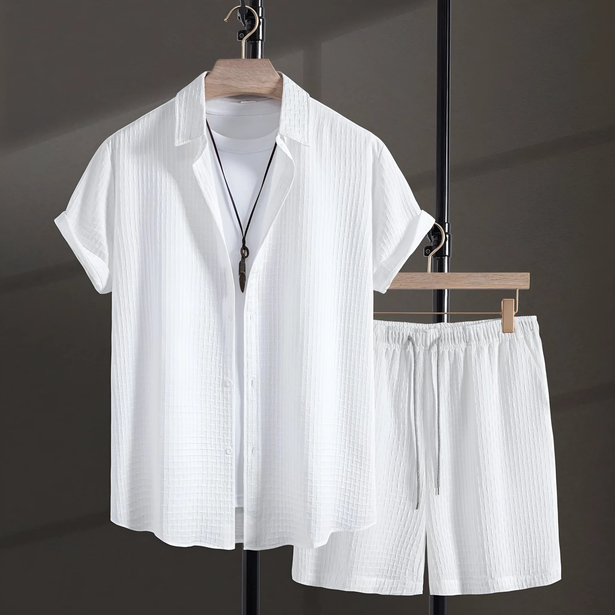 Men's casual cotton blend short sleeve shirt and shorts set in black, laid flat.