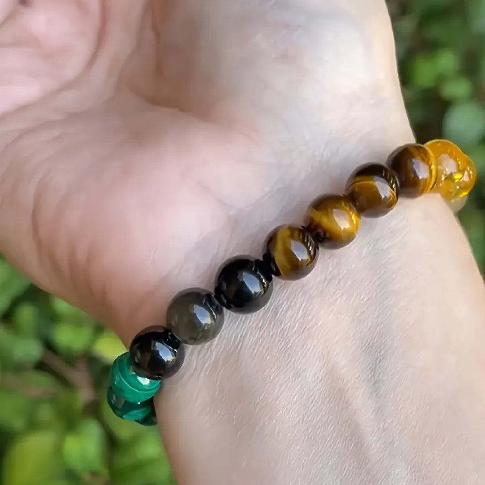 Natural stone bracelet with citrine, dongling stone, and malachite in a crystal setting, unisex design