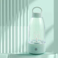 Automatic electric shaker bottle with USB charging port, handle, and lid in green, pink, or white.