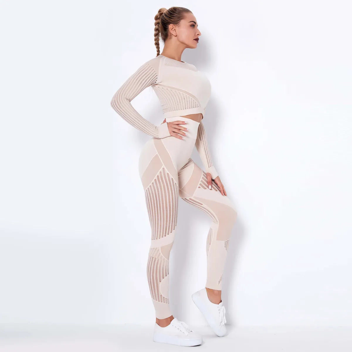 Women's long-sleeved seamless yoga wearsuit in a dark colour, shown in a yoga pose.