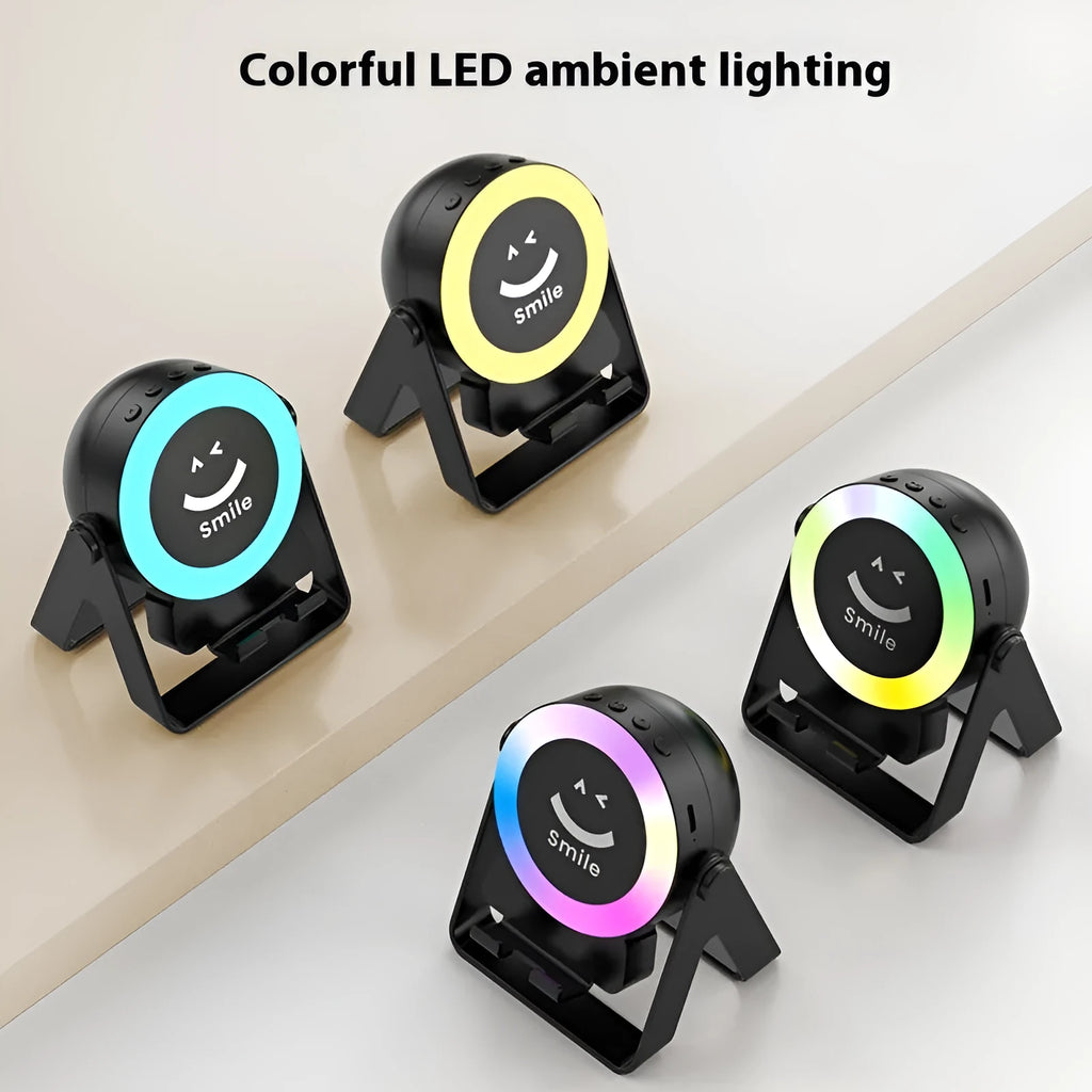 Black or white induction bracket wireless Bluetooth speaker with rechargeable battery and lighting features.