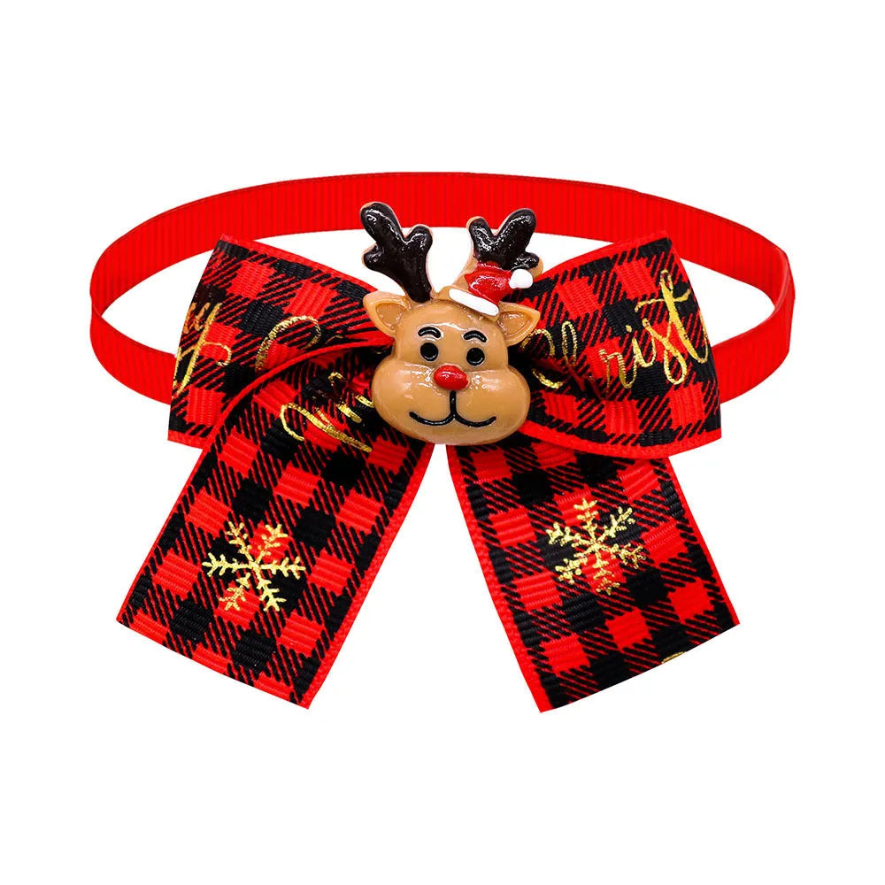 Red and green polyester Christmas pet bow tie in British style on a white background