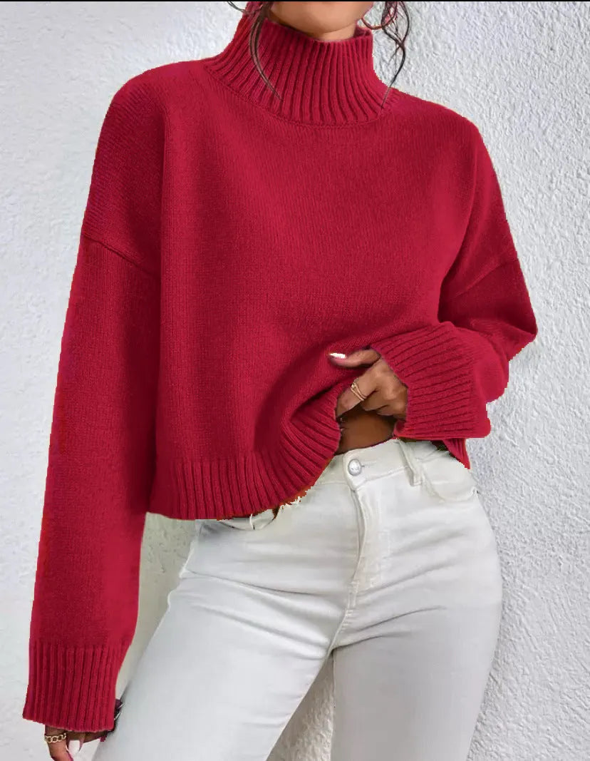 Loose versatile basic women's pullover in gray, showing thread texture and relaxed fit