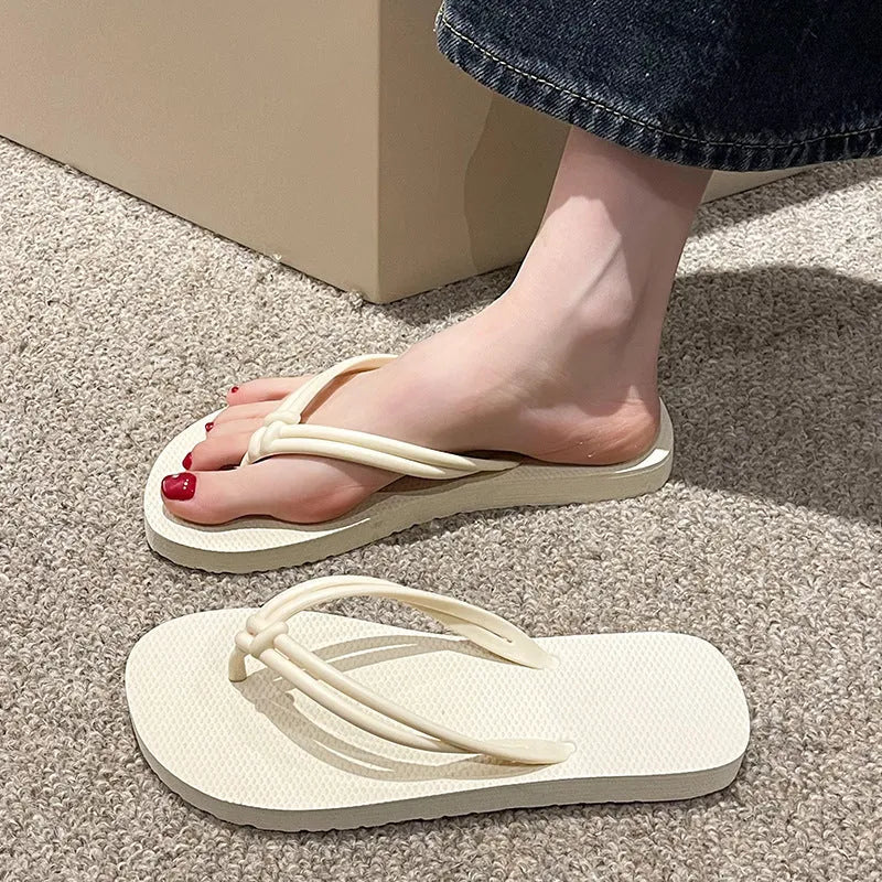 PVC casual flip flops with toe-covering design and injection moulded non-slip soles