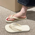 PVC casual flip flops with toe-covering design and injection moulded non-slip soles