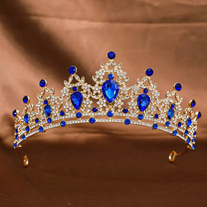 Gold alloy crown-shaped wedding hair headdress with electroplated finish on neutral background