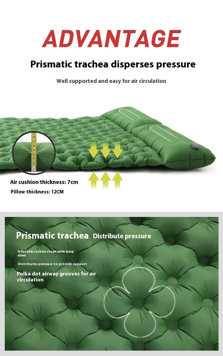 Dark blue double air mattress with built-in pump inflated on a floor, showing integrated pillow.