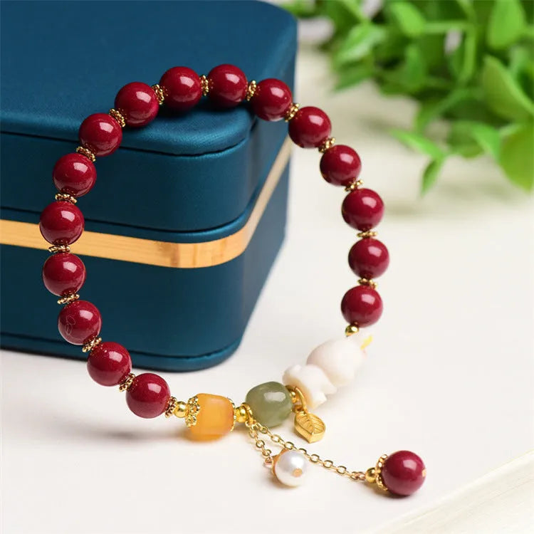 Traditional Chinese cinnabar bracelet with rabbit design in 8mm and 10mm bead size options.