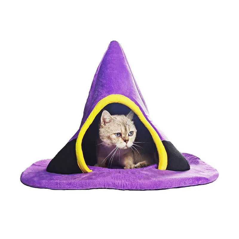 Purple Halloween witch hat shaped cat bed for pets, showing soft cloth material and enclosed design.