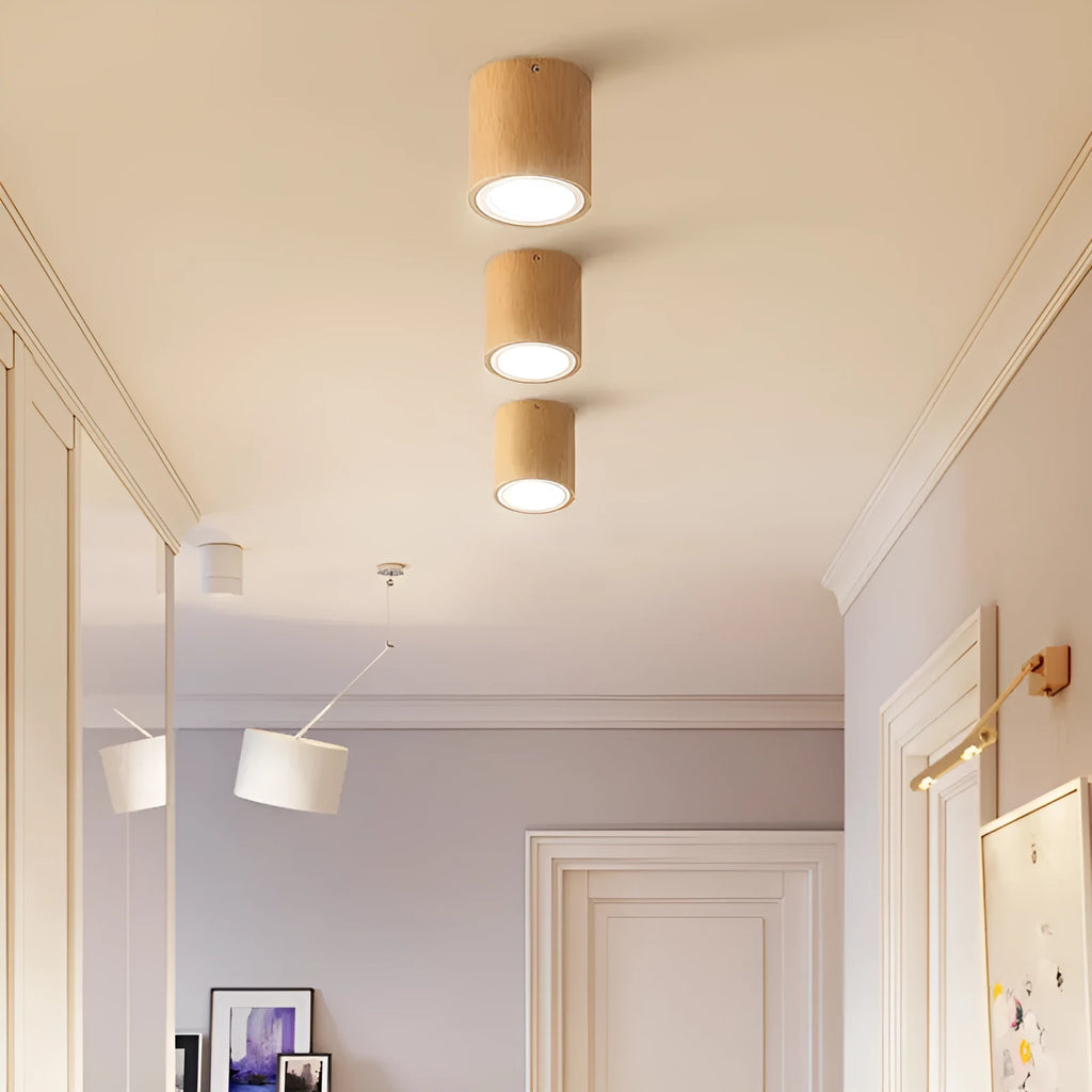 Modern solid wood surface mounted downlight in square and round shapes, shown in a wood colour finish.