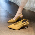 Women's suede pointed-toe stiletto high heels in apricot, pink, sky blue, and yellow colours on a rubber sole.