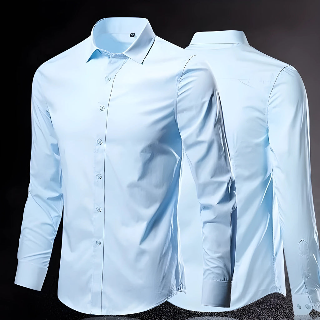Man wearing a loose slim-fit linen long-sleeve shirt in a neutral colour.