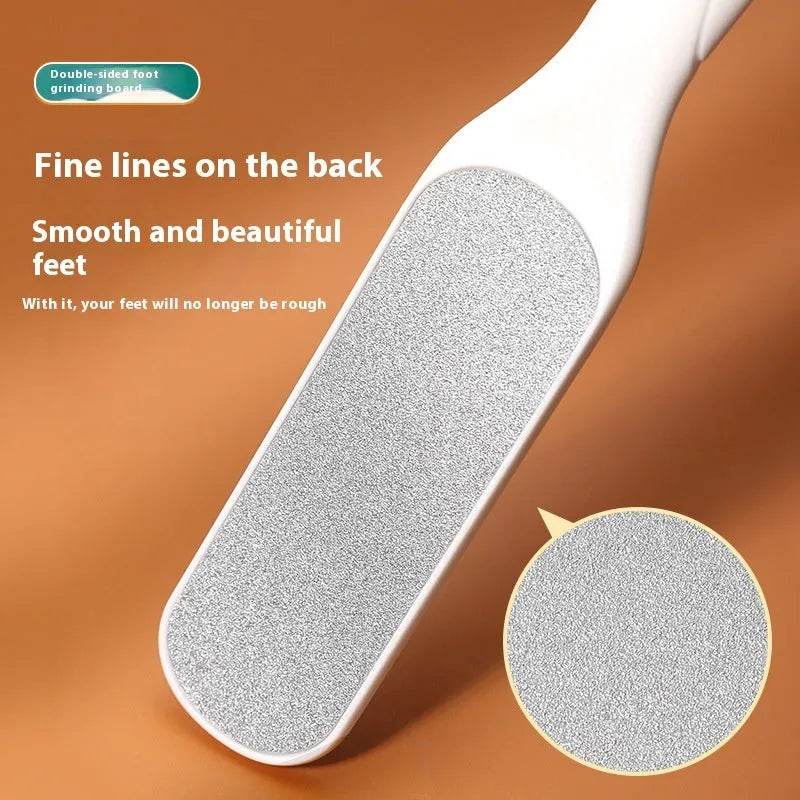 Stainless steel foot file with handle and two double-sided sandpaper pads for callus removal.