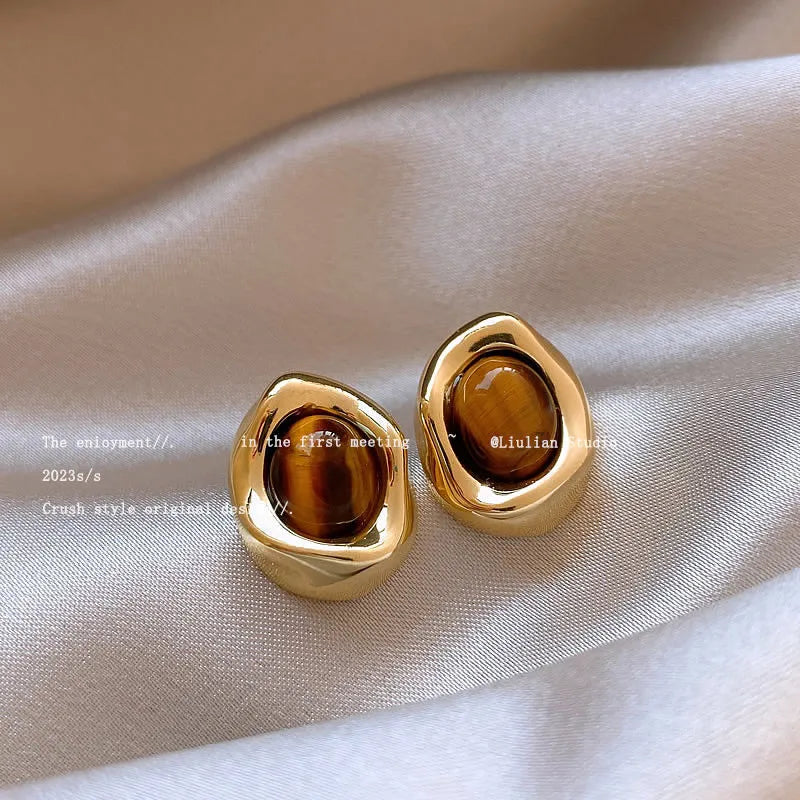 Handmade geometric alloy earrings with tassel elements in three holiday styles
